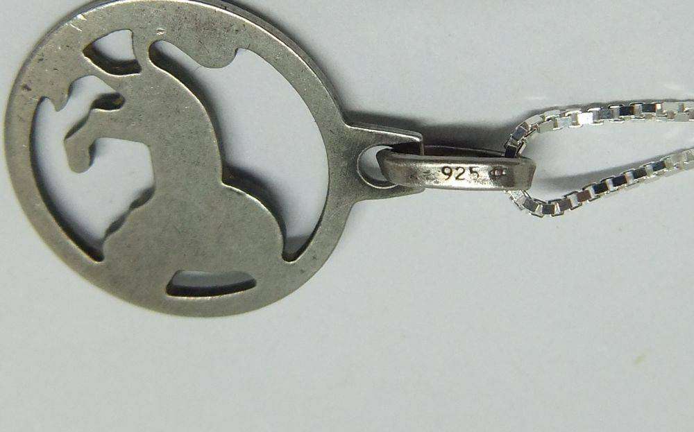 A vintage sterling silver Leo lion Zodiac pendant plus sterling silver necklace