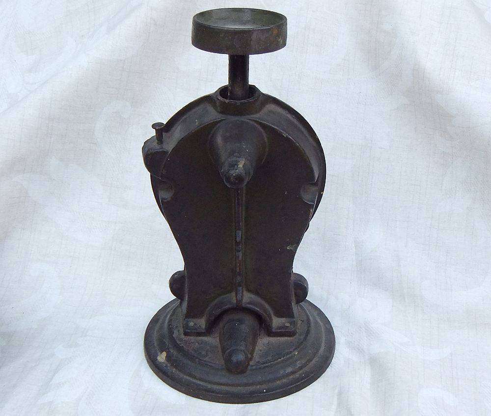 An amazing heavy antique cast iron scale with original weigh pan