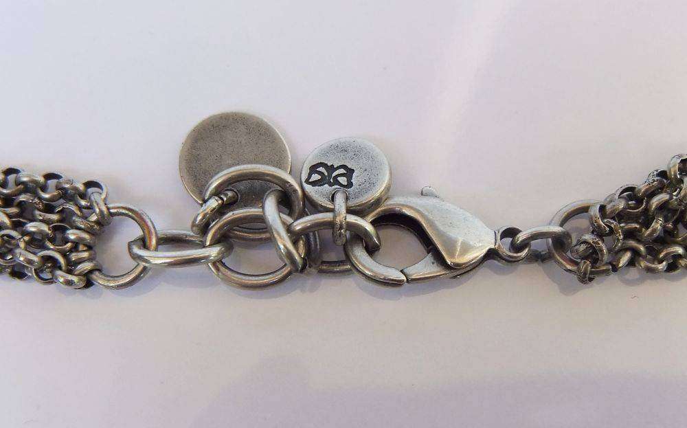 A gorgeous high class genuine Miglio metal necklace with faceted heart pendant