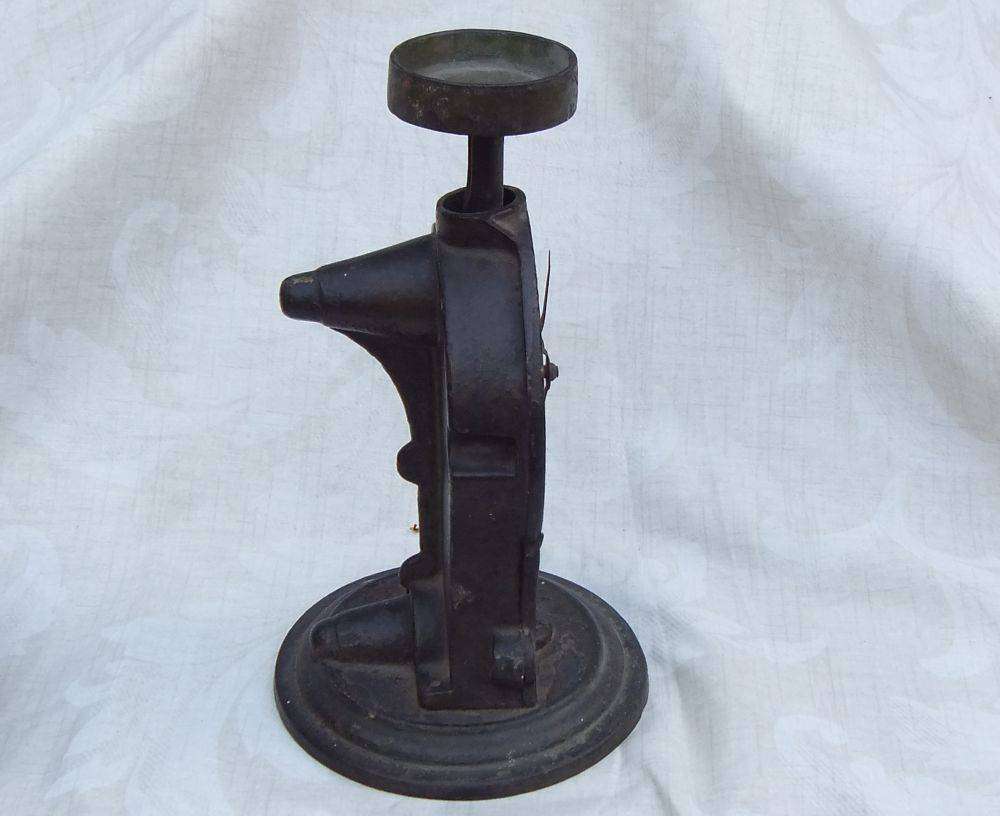 An amazing heavy antique cast iron scale with original weigh pan