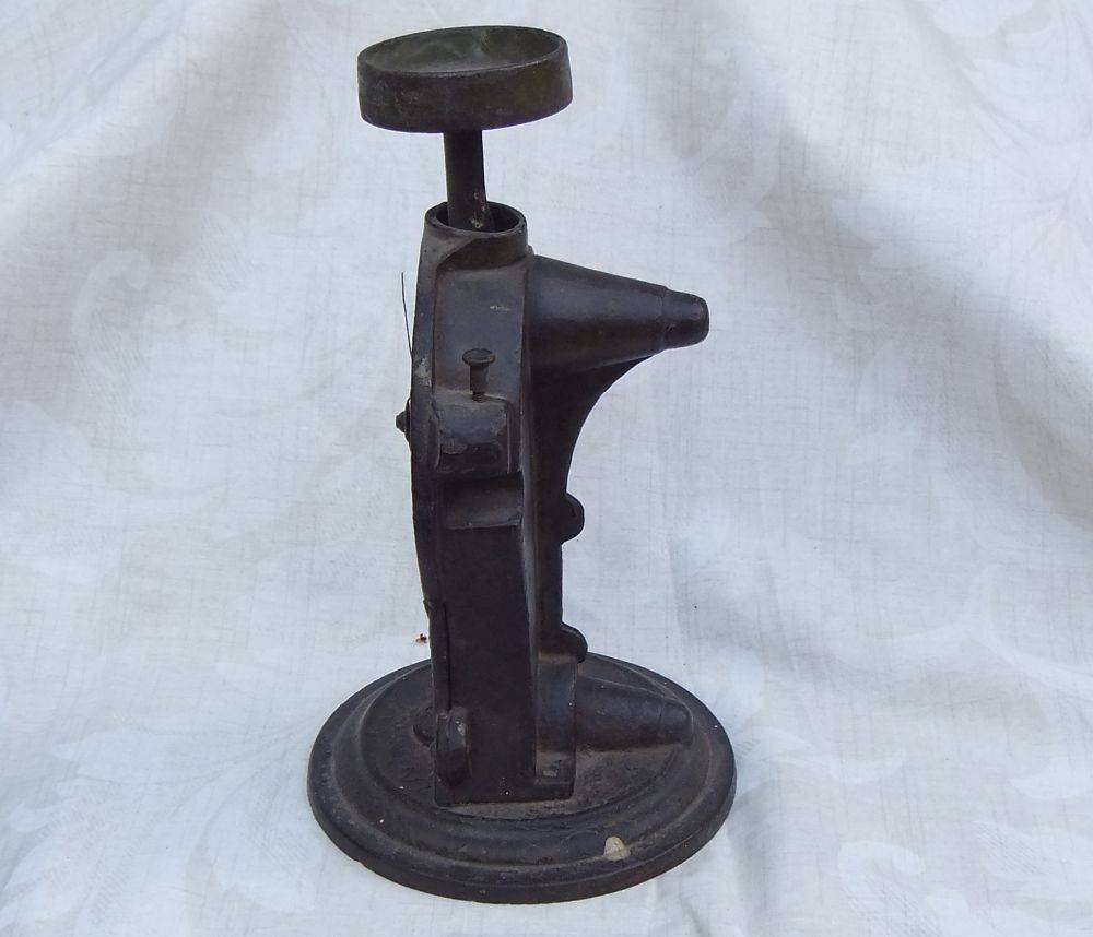 An amazing heavy antique cast iron scale with original weigh pan
