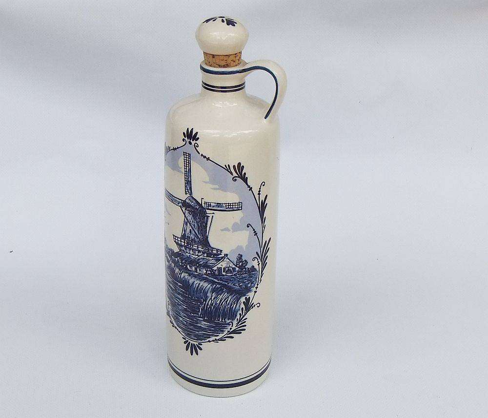An awesome vintage Delfts Blue decanter made for Bols brandy with windmill motif