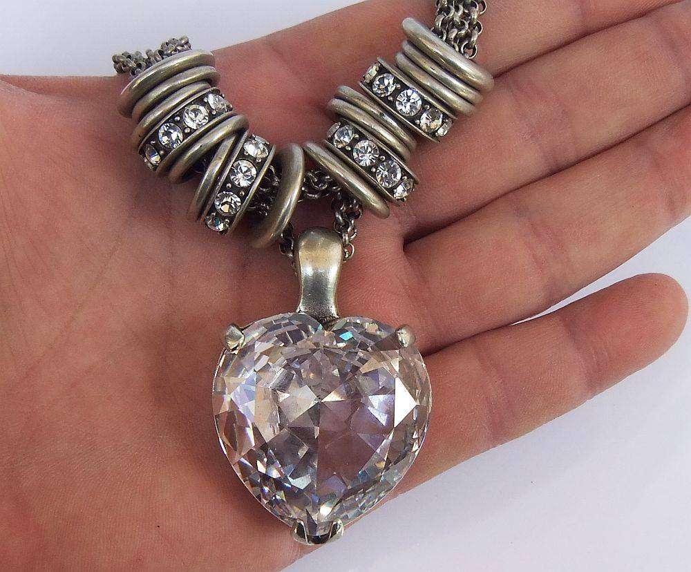 A gorgeous high class genuine Miglio metal necklace with faceted heart pendant