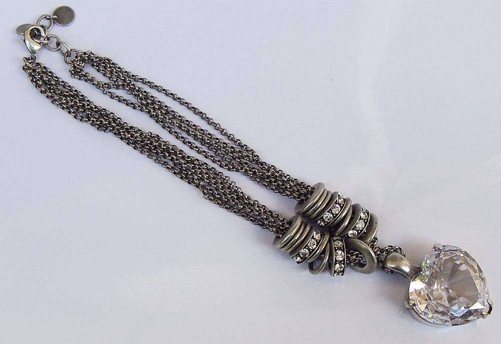 A gorgeous high class genuine Miglio metal necklace with faceted heart pendant