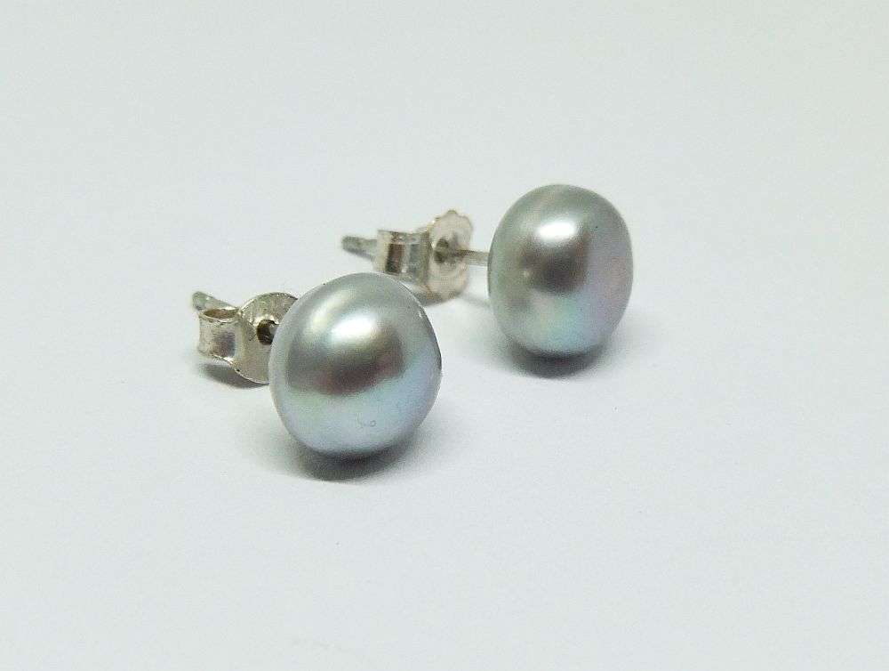 A CLASSY PAIR OF GENUINE FRESHWATER PEARL AND STERLING SILVER EARRINGS WITH THEIR BUTTERFLIES