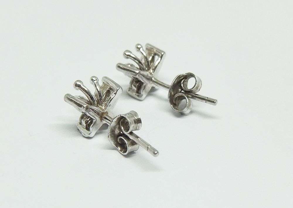 A CHARMING PAIR OF FACETED CZ SET STERLING SILVER BUTTERFLY MOTIF STUD EARRINGS IN GREAT CONDITION