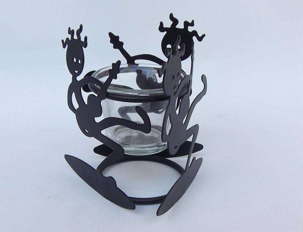An adorable abstract tealight candle holder with fun motif and cool lighting effect