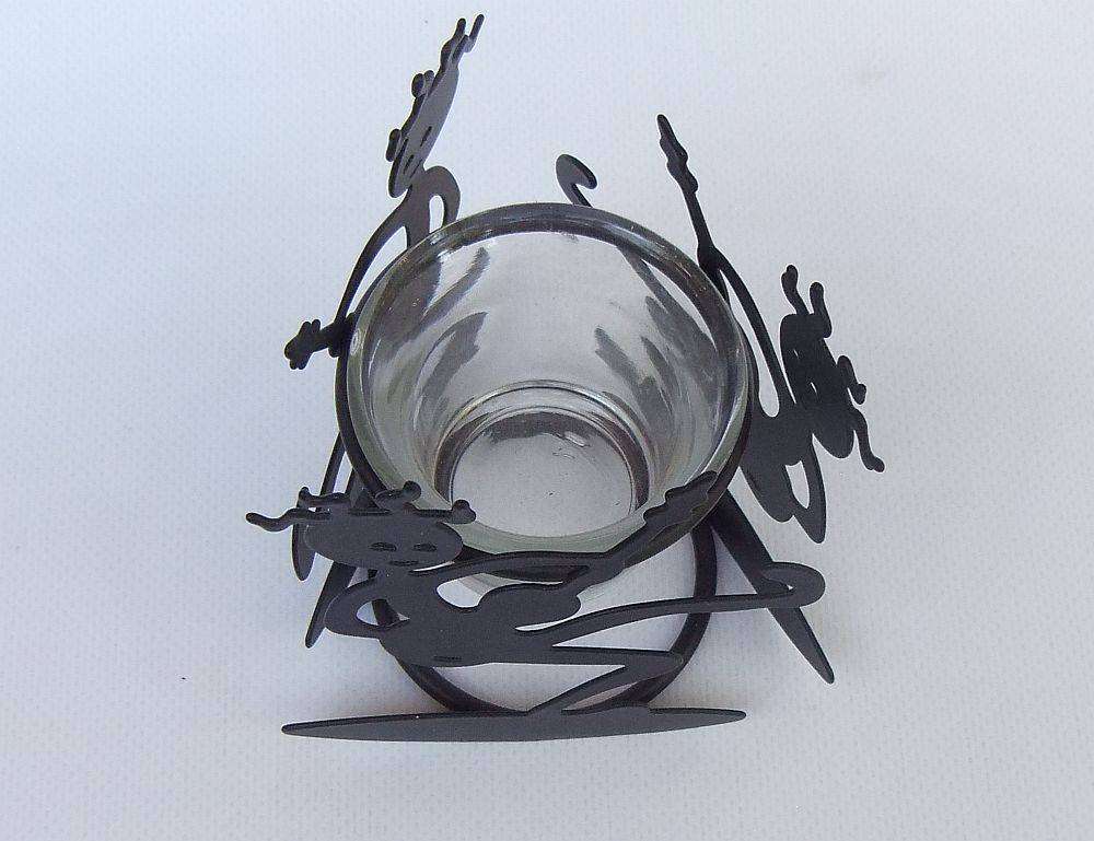 An adorable abstract tealight candle holder with fun motif and cool lighting effect