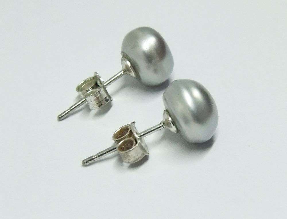 A CLASSY PAIR OF GENUINE FRESHWATER PEARL AND STERLING SILVER EARRINGS WITH THEIR BUTTERFLIES