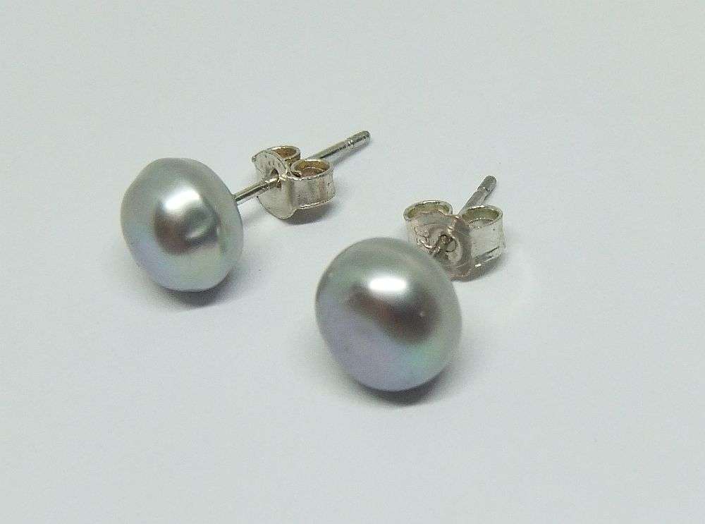 A CLASSY PAIR OF GENUINE FRESHWATER PEARL AND STERLING SILVER EARRINGS WITH THEIR BUTTERFLIES