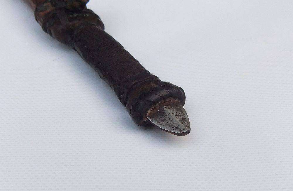 A rare antique North African Tuareg tribal dagger with leather sheath and handle