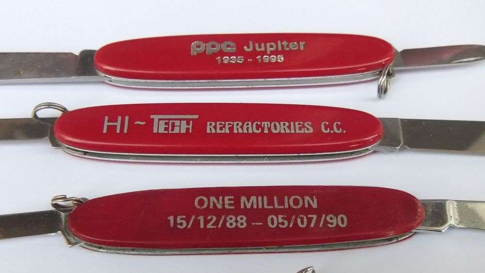 THREE VINTAGE VICTORINOX POCKET KNIVES  AND A NO NAME POCKET KNIFE WITH ADVERTISING