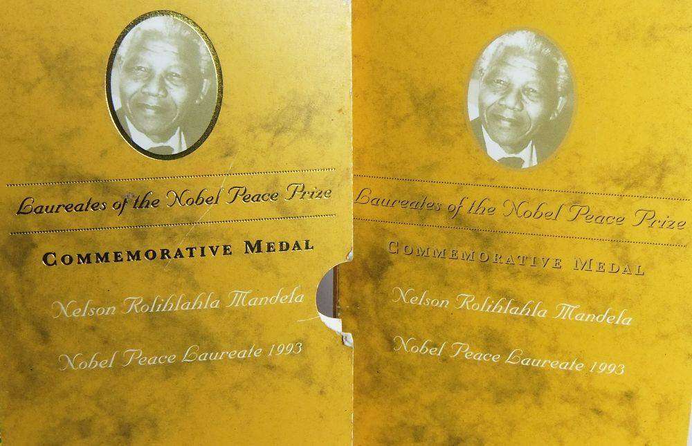 A limited edition 2001 solid sterling silver Nelson Mandela medallion by the Mint of Norway