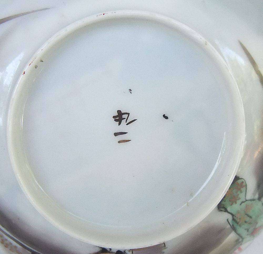 A stunning signed hand painted antique Japanese porcelain duo