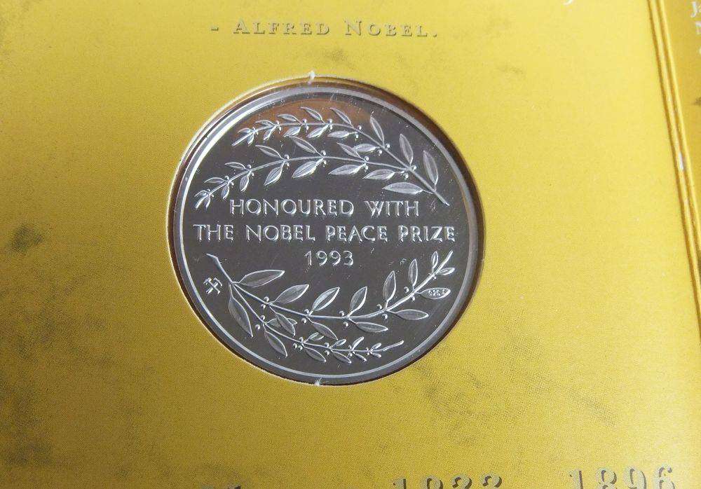 A limited edition 2001 solid sterling silver Nelson Mandela medallion by the Mint of Norway