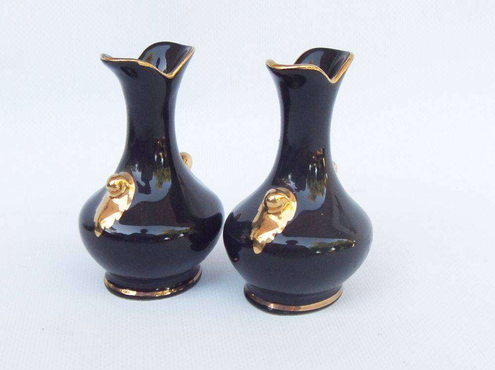 A pair of cute vintage South African pottery posy vases by Crescent Potteries