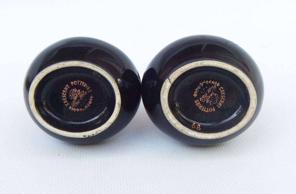 A pair of cute vintage South African pottery posy vases by Crescent Potteries