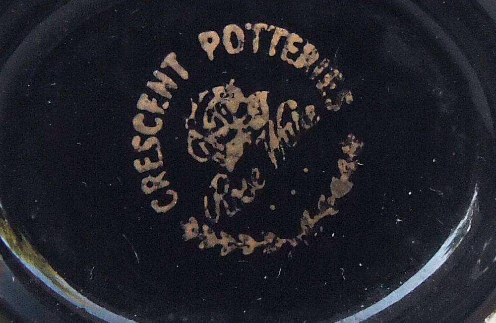 A pair of cute vintage South African pottery posy vases by Crescent Potteries