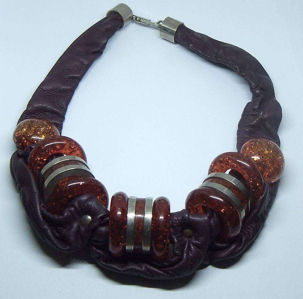 A vintage leather , acrylic bead and metal necklace by modernist Italian designer Wilma Spagli