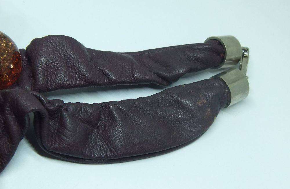 A vintage leather , acrylic bead and metal necklace by modernist Italian designer Wilma Spagli