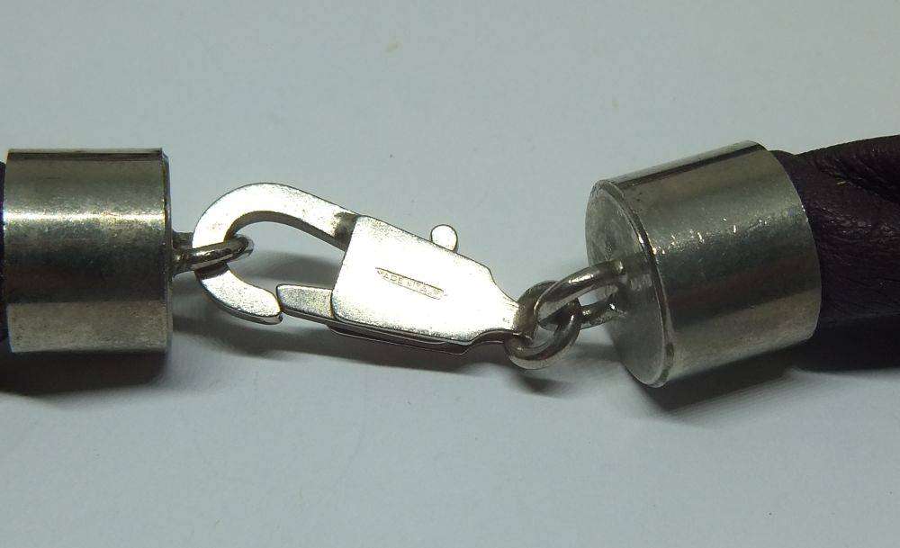 A vintage leather , acrylic bead and metal necklace by modernist Italian designer Wilma Spagli