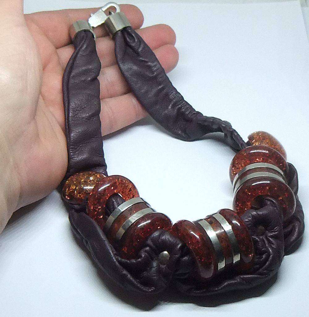 A vintage leather , acrylic bead and metal necklace by modernist Italian designer Wilma Spagli