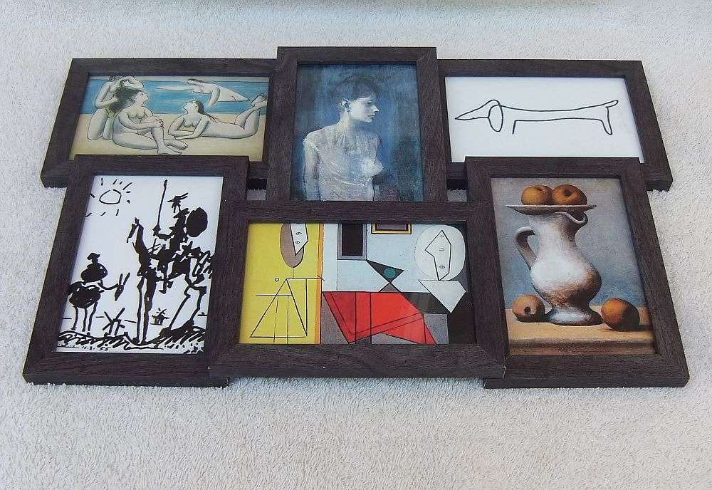 AN AWESOME WALL MOUNTING DEPICTING WORKS BY PICASSO ( PRINTS )