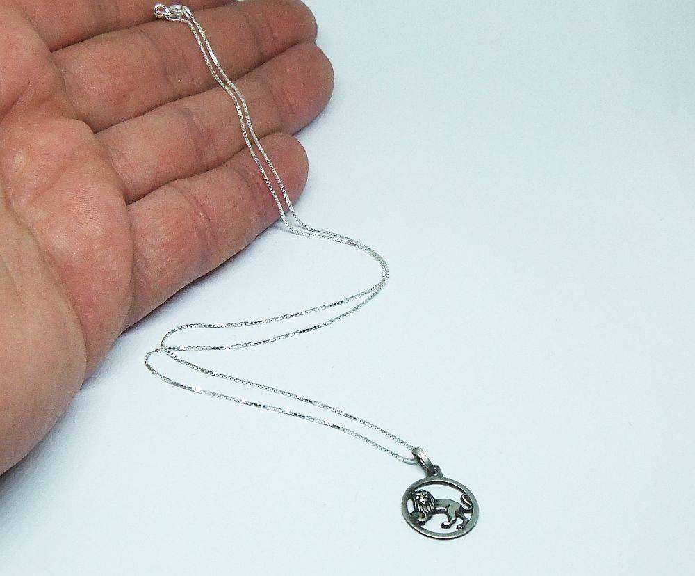 A vintage sterling silver Leo lion Zodiac pendant plus sterling silver necklace