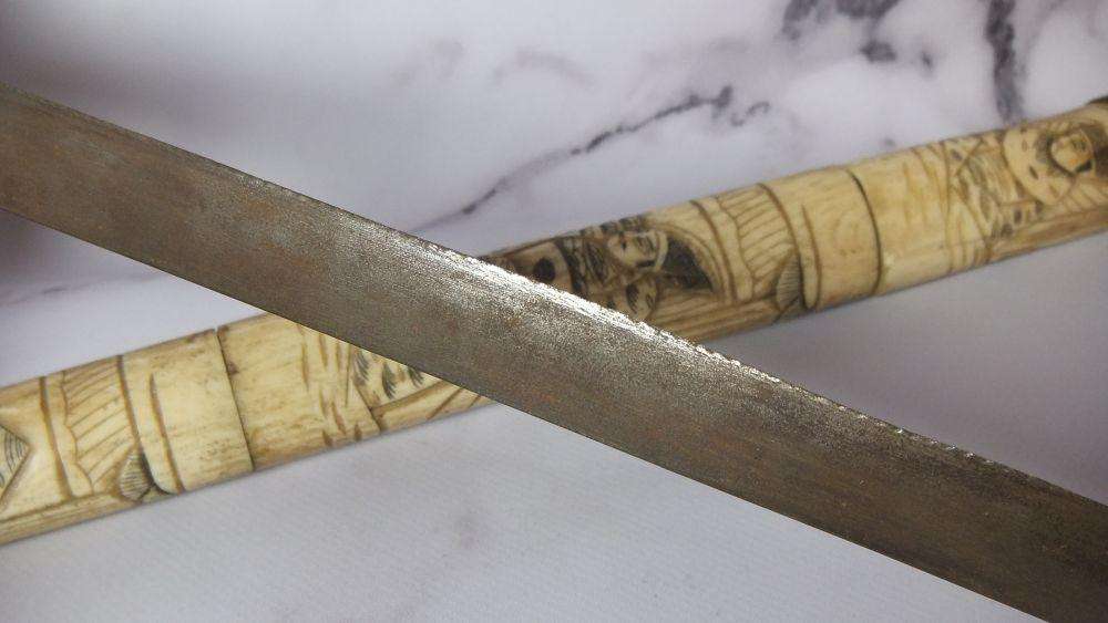 AN ABSOLUTELY RARE ANTIQUE JAPANESE CARVED BONE SHORT SWORD IN DISPLAY CONDITION - NOT FOR USE