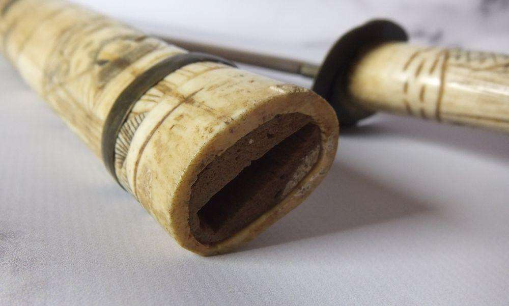 AN ABSOLUTELY RARE ANTIQUE JAPANESE CARVED BONE SHORT SWORD IN DISPLAY CONDITION - NOT FOR USE