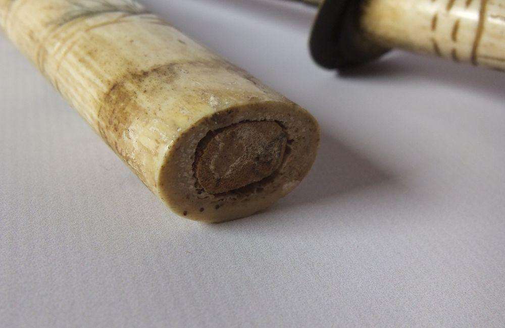 AN ABSOLUTELY RARE ANTIQUE JAPANESE CARVED BONE SHORT SWORD IN DISPLAY CONDITION - NOT FOR USE