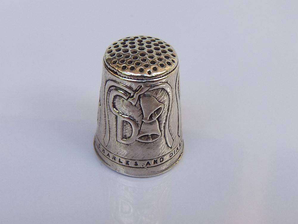 A vintage hallmarked sterling silver thimble made to commemorate the marriage of Charles & Diana
