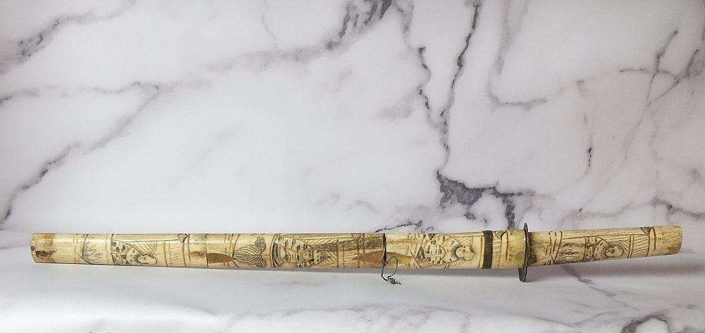 AN ABSOLUTELY RARE ANTIQUE JAPANESE CARVED BONE SHORT SWORD IN DISPLAY CONDITION - NOT FOR USE