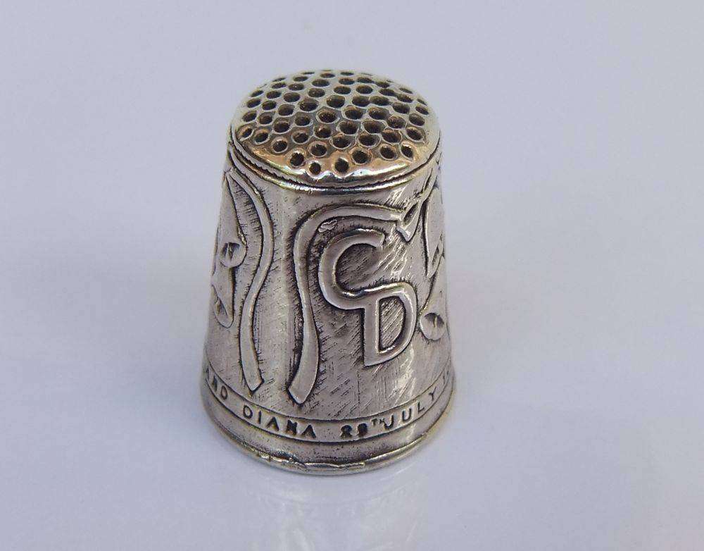 A vintage hallmarked sterling silver thimble made to commemorate the marriage of Charles & Diana