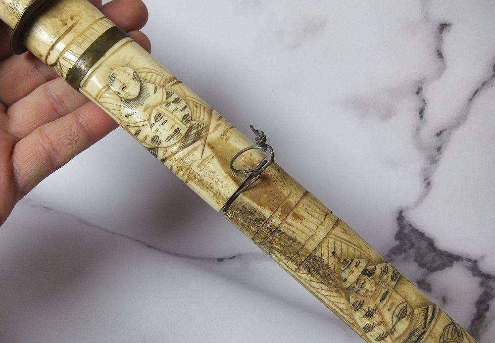 AN ABSOLUTELY RARE ANTIQUE JAPANESE CARVED BONE SHORT SWORD IN DISPLAY CONDITION - NOT FOR USE