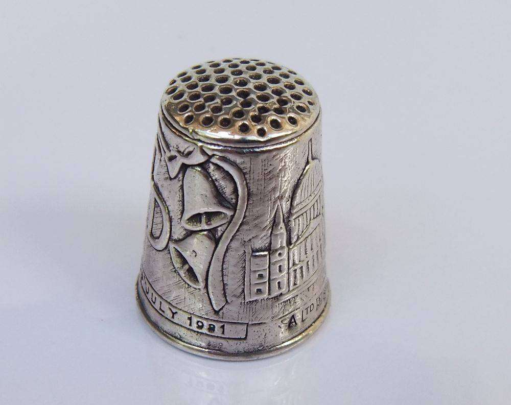 A vintage hallmarked sterling silver thimble made to commemorate the marriage of Charles & Diana