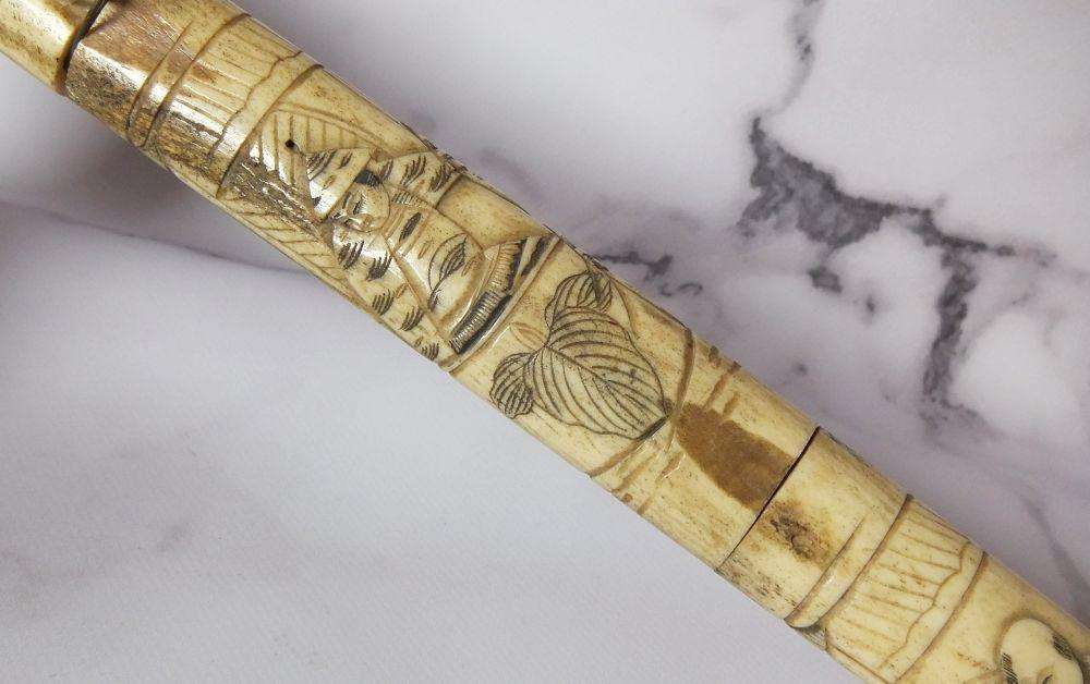 AN ABSOLUTELY RARE ANTIQUE JAPANESE CARVED BONE SHORT SWORD IN DISPLAY CONDITION - NOT FOR USE