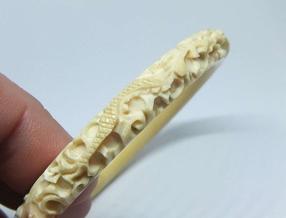 A STUNNING 1920`S CHINESE CARVED BONE BANGLE WITH INTRICATE DRAGON DESIGN !! EXCELLENT CONDITION !!