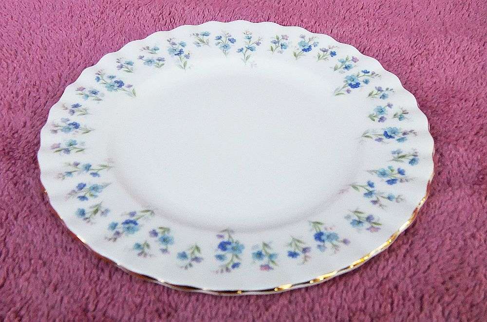 A VINTAGE ROYAL ALBERT TRIO IN THE MEMORY LANE PATTERN