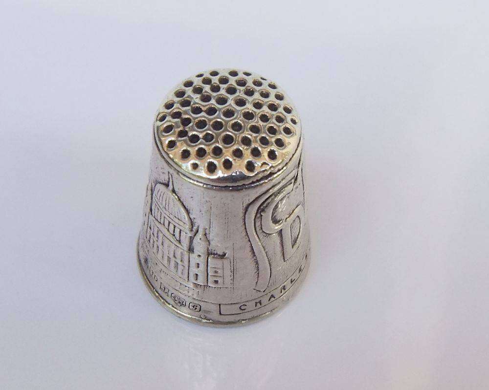 A vintage hallmarked sterling silver thimble made to commemorate the marriage of Charles & Diana