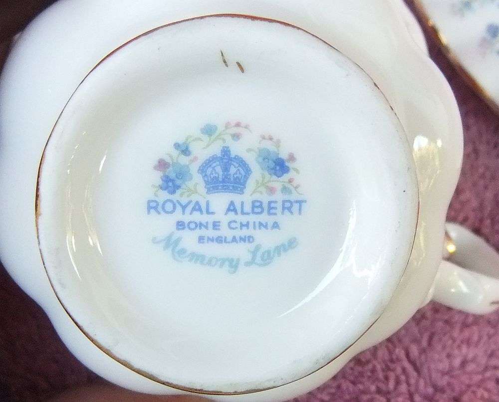 A VINTAGE ROYAL ALBERT TRIO IN THE MEMORY LANE PATTERN