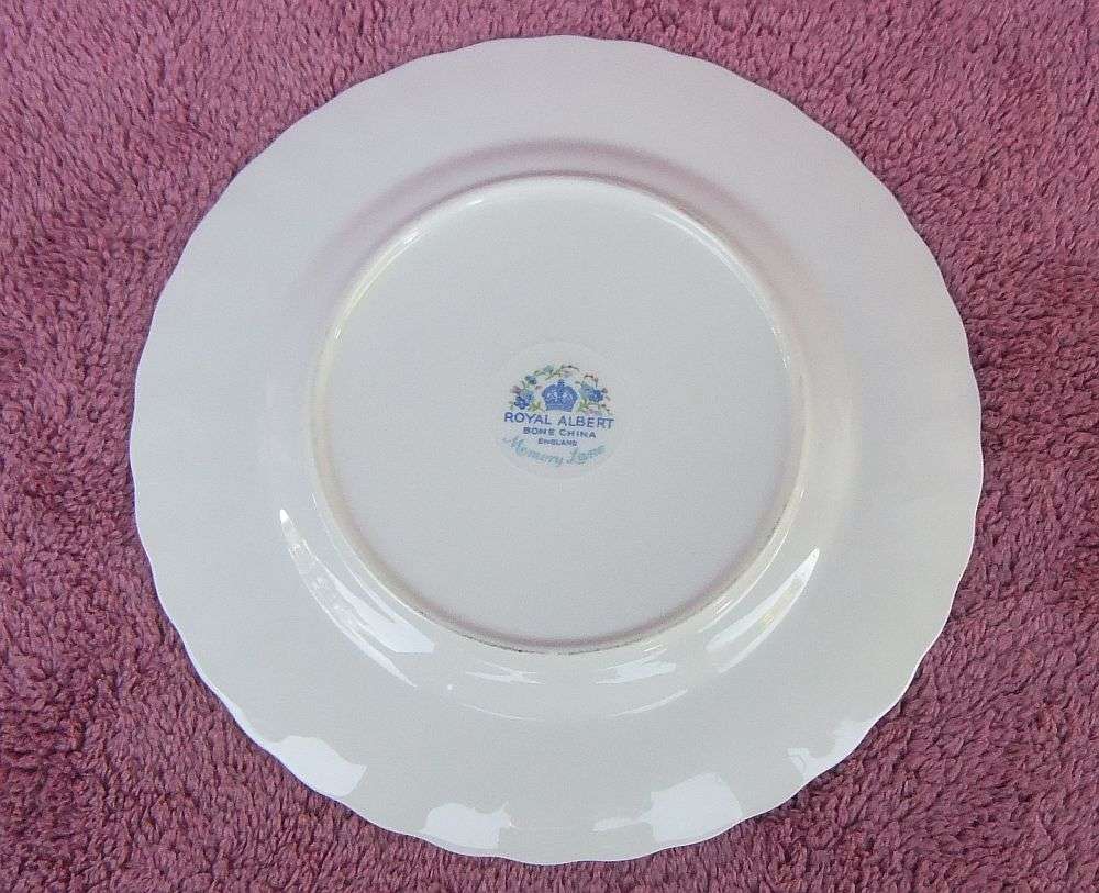 A VINTAGE ROYAL ALBERT TRIO IN THE MEMORY LANE PATTERN