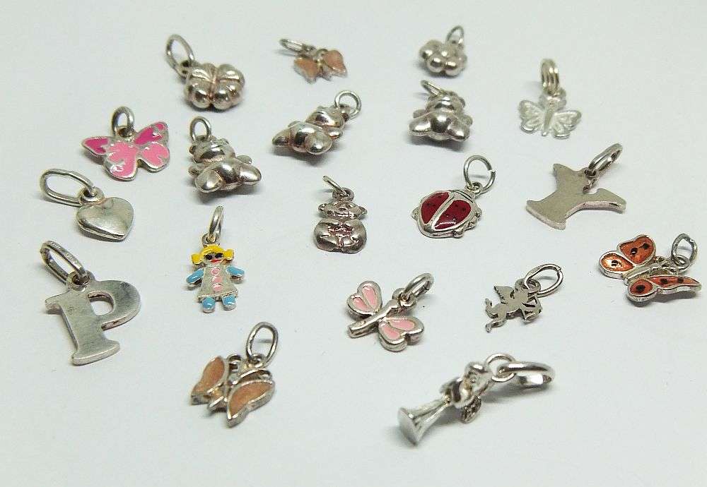 WOW !! AN ADORABLE LOT OF 19 STERLING SILVER CHARMS !! BID FOR THE LOT !!