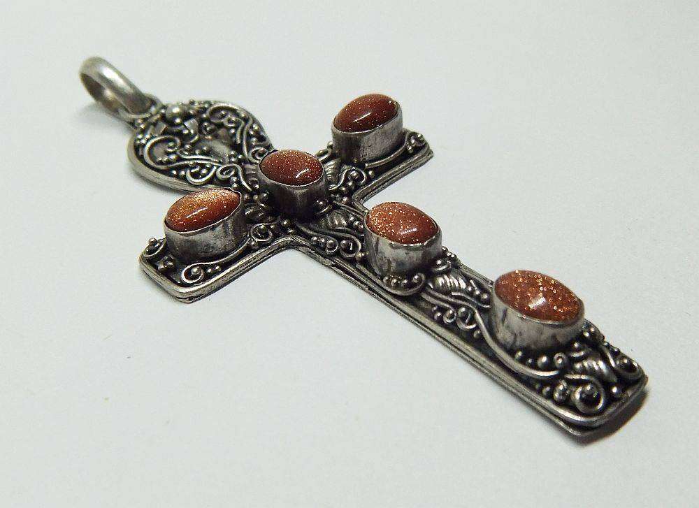 A stunning vintage Ankh style pendant with glittery cabochon Sunstone insets