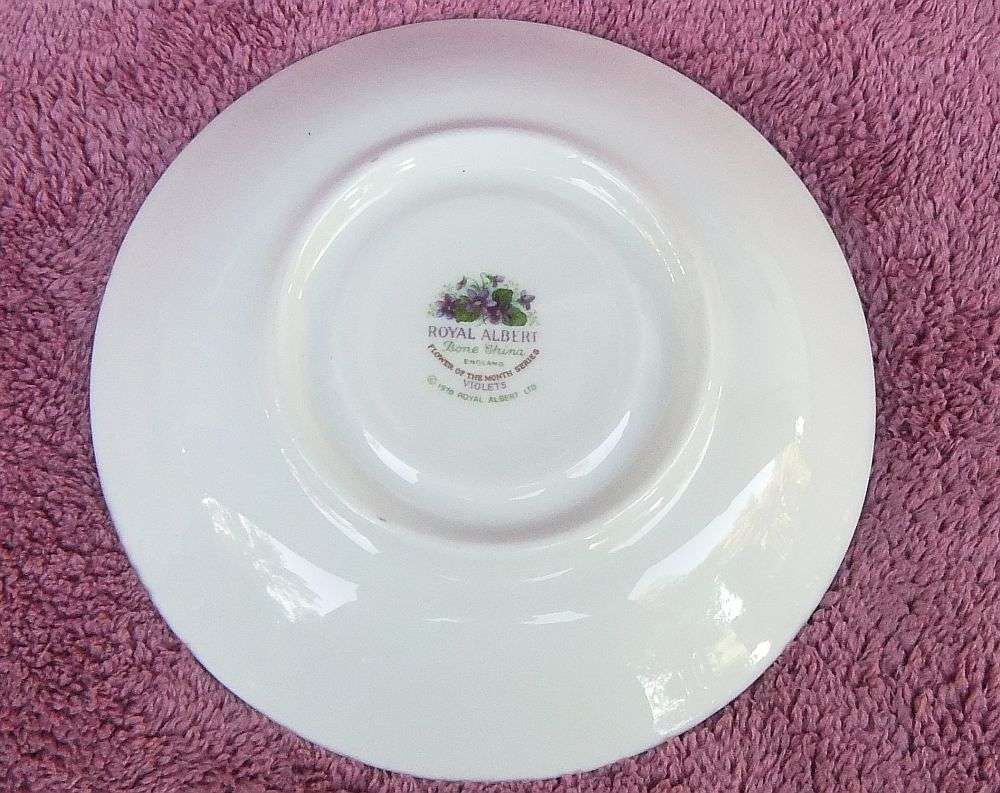 A VINTAGE ROYAL ALBERT TRIO - FLOWER OF THE MONTH SERIES - FEBRUARY