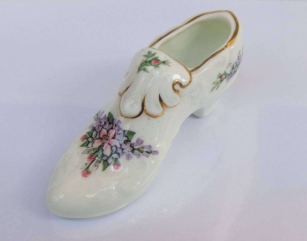 A very charming vintage porcelain trinket holder modelled as a Victorian shoe by Royal Albert
