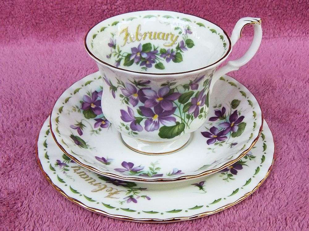 A VINTAGE ROYAL ALBERT TRIO - FLOWER OF THE MONTH SERIES - FEBRUARY