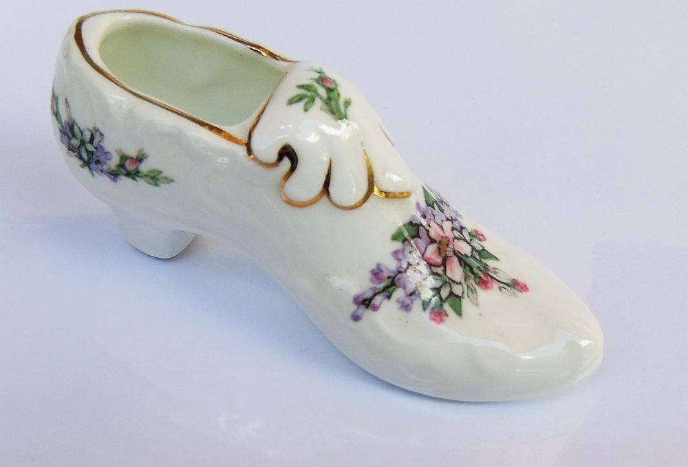 A very charming vintage porcelain trinket holder modelled as a Victorian shoe by Royal Albert