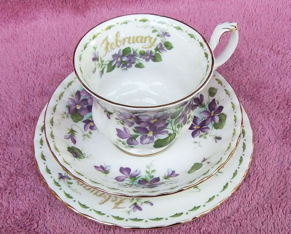 A VINTAGE ROYAL ALBERT TRIO - FLOWER OF THE MONTH SERIES - FEBRUARY