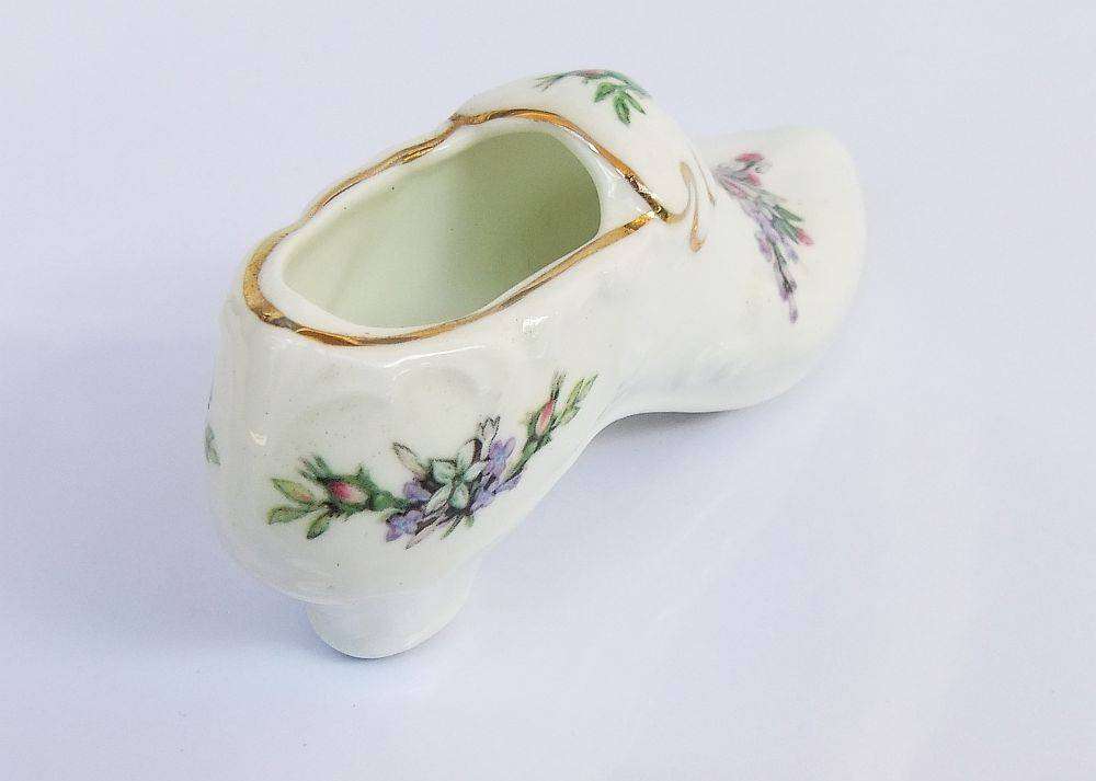 A very charming vintage porcelain trinket holder modelled as a Victorian shoe by Royal Albert
